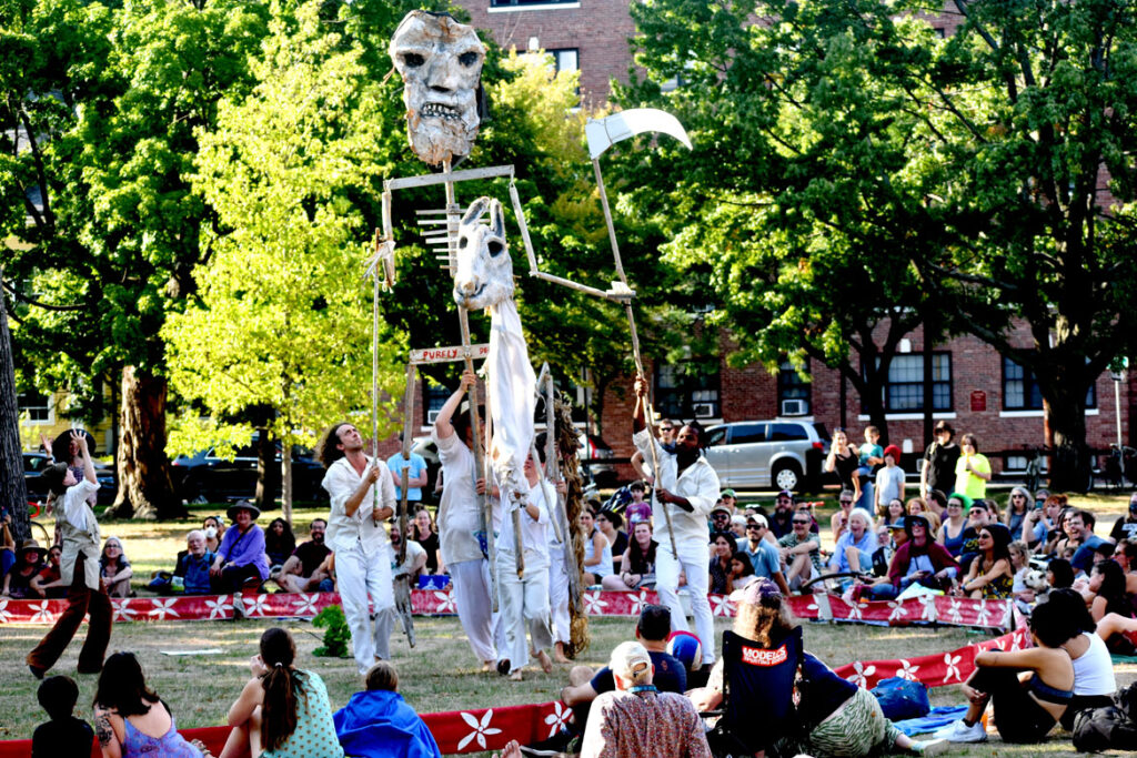 Bread and Puppet Theater performs its “Apocalypse Defiance Circus” on Cambridge Common, Sept. 4, 2022. (© Greg Cook photo)