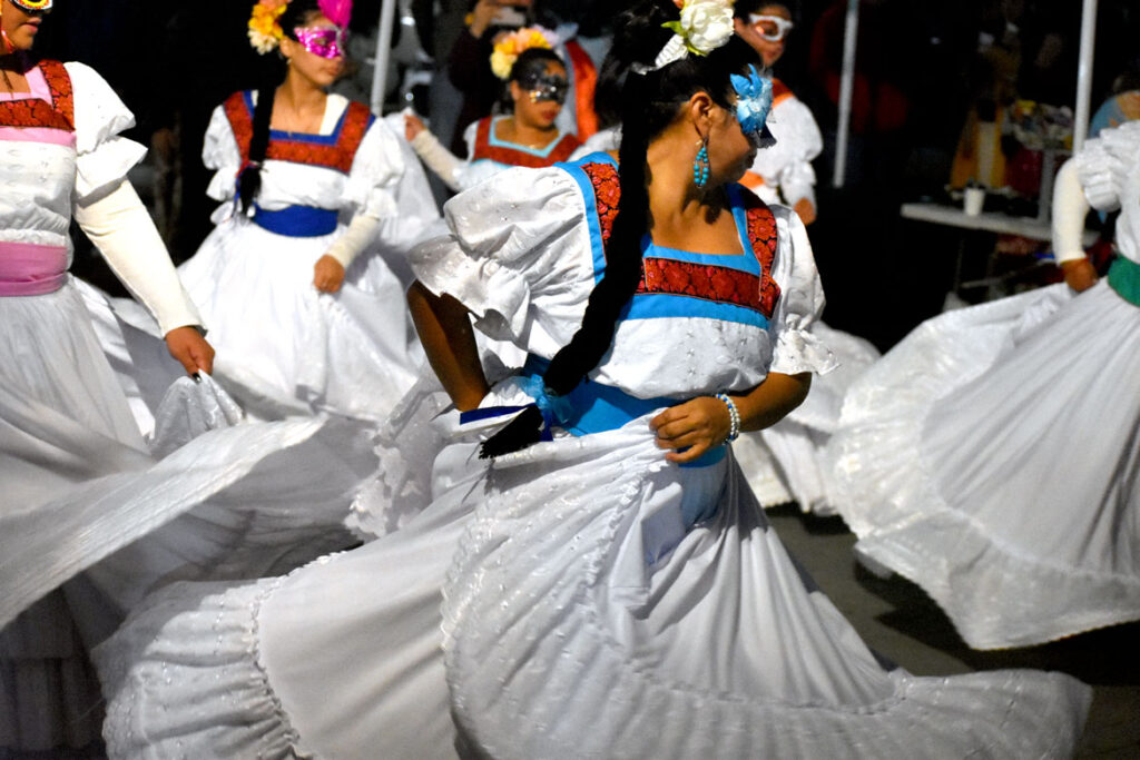 Dancers at the Dia de los Muertos celebration in Chelsea, Massachusetts, Oct. 29, 2022. (©Greg Cook photo)