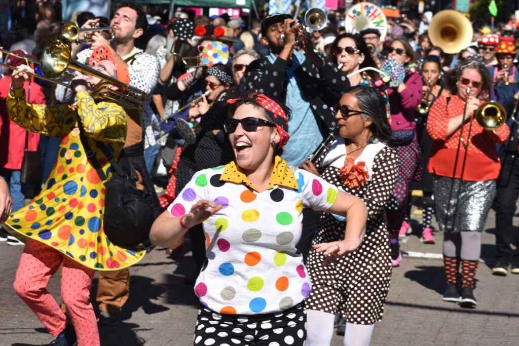School of Honk from Somerville performs in the Honk parade from Somerville's Davis Square to Cambridge's Harvard Square, Sunday, Oct 9, 2022 (©Greg Cook photo)