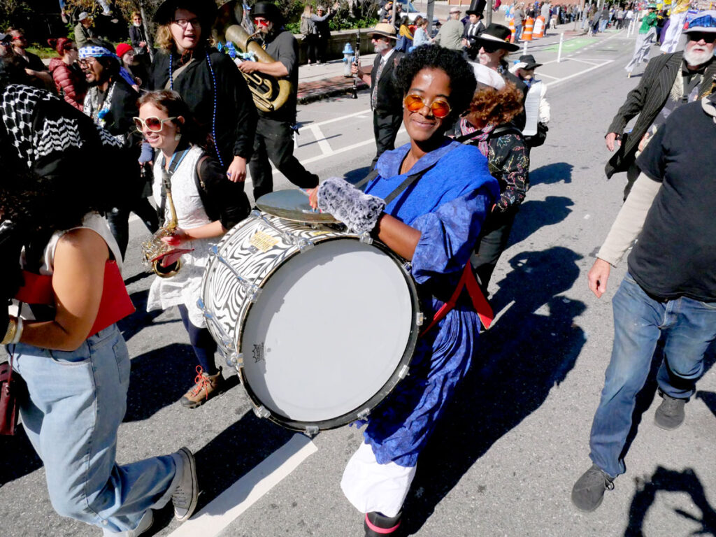 The Bread & Puppet Circus Band from Vermont performs in the Honk parade from Somerville's Davis Square to Cambridge's Harvard Square, Sunday, Oct 9, 2022 (©Greg Cook photo)