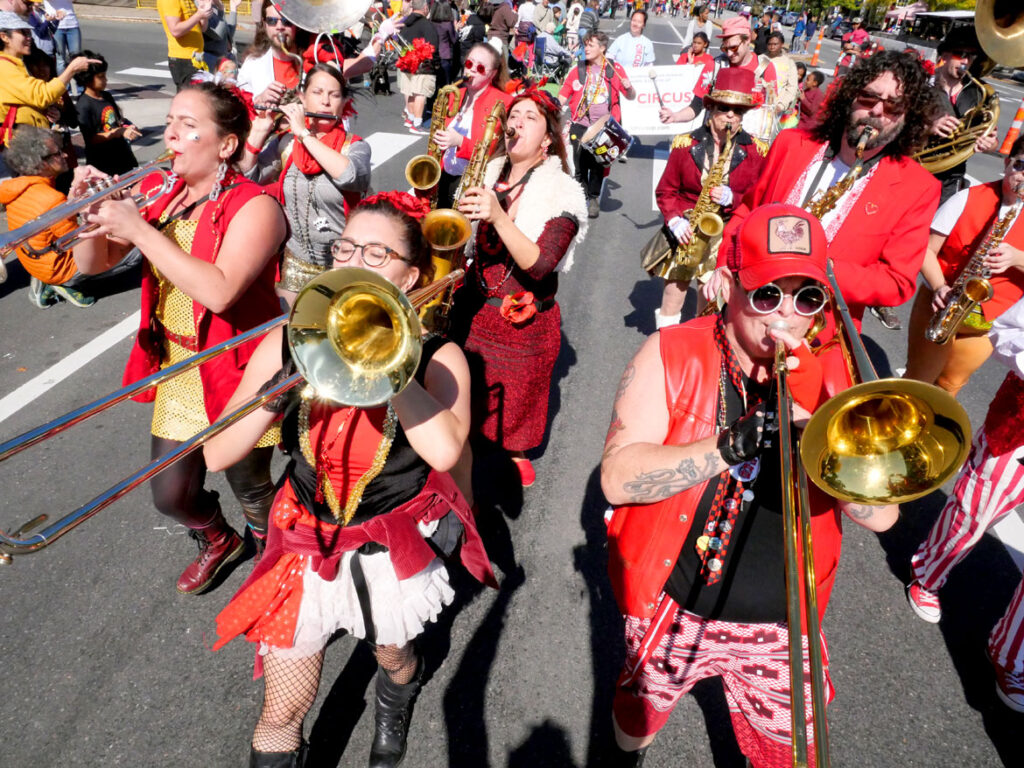The Extraordinary Rendition Band from Providence performs in the Honk parade from Somerville's Davis Square to Cambridge's Harvard Square, Sunday, Oct 9, 2022 (©Greg Cook photo)