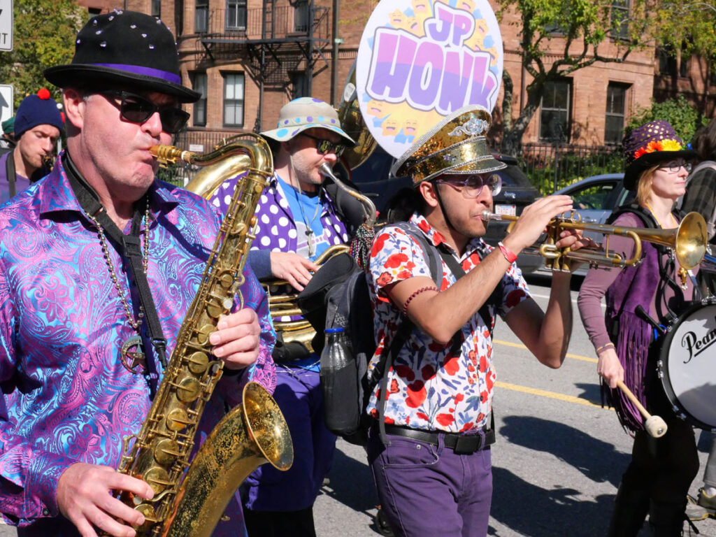 The J.P. Honk Band from Boston's Jamaica Plain neighborhood performs in the Honk parade from Somerville's Davis Square to Cambridge's Harvard Square, Sunday, Oct 9, 2022 (©Greg Cook photo)