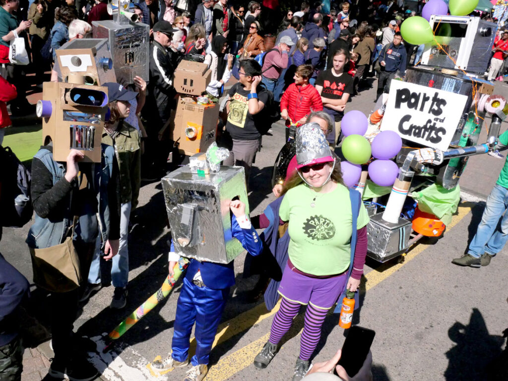 Parts and Crafts, the Somerville maker space, marches in the Honk parade from Somerville's Davis Square to Cambridge's Harvard Square, Sunday, Oct 9, 2022 (©Greg Cook photo)