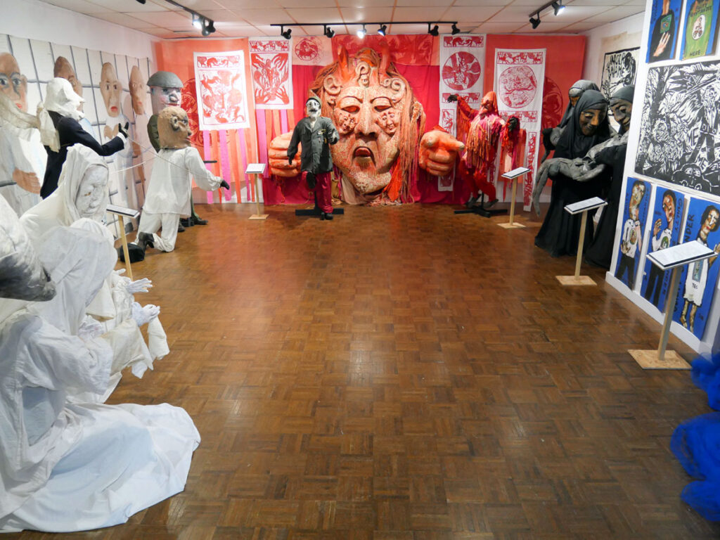The exhibition “Bread and Puppet Theater: Art and Activism in Five Acts” at Salem State University, November 2022. (©Greg Cook photo)