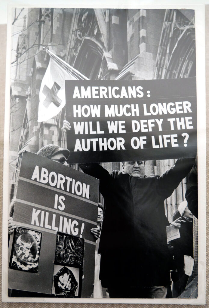 Anti-choice "Right to Life" at St. Patrick's Cathedral, photo by Bettye Lane, March 9, 1976. In "The Age of Roe: The Past, Present, and Future of Abortion in America" at Harvard Radcliffe Institute Schlesinger Library's Poorvu Gallery.