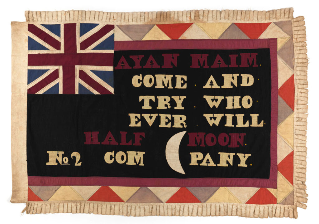 Possibly Kweku Kakanu, Saltpond workshop, Made for No. 2 Company Enyan Maim, c. 1945; cotton. Eschewing any figurative motifs, this flag focuses on text, which reads in part, “Come and try who ever will,” echoing the common challenge “come and try” that is frequently issued by companies to their rivals.