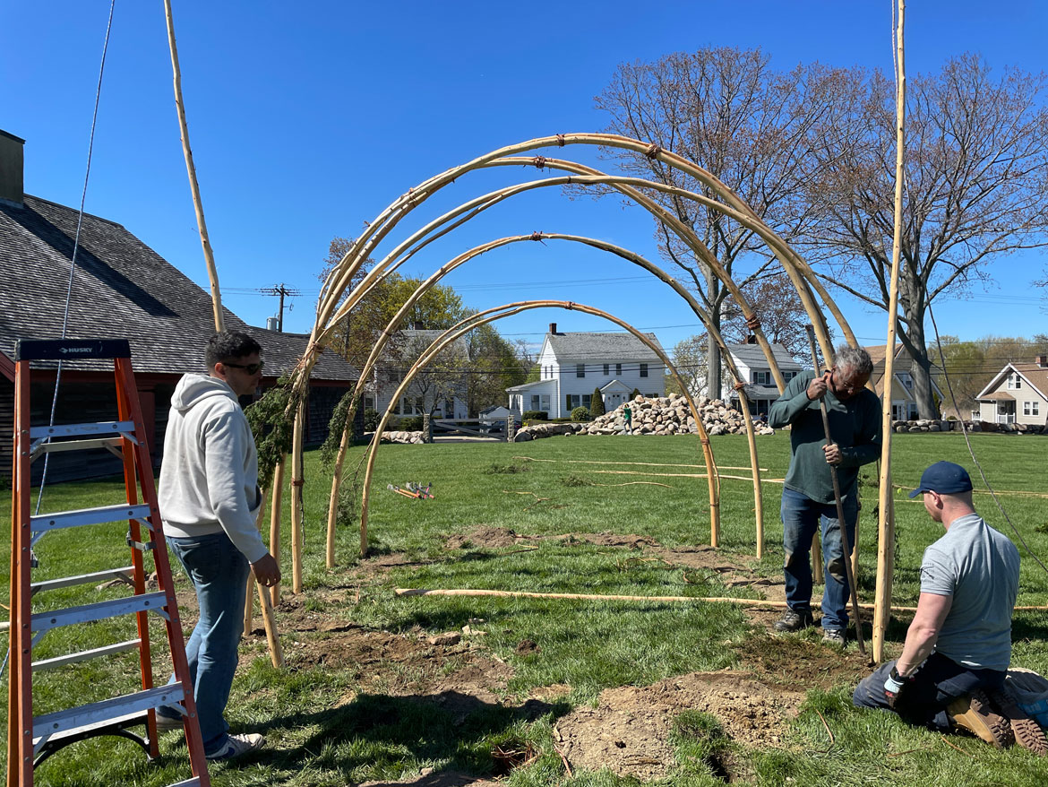 SmokeSygnals and partners contructing a wetu for "Native Waters; Native Lands" at the Cape Ann Museum Green, Gloucester, on May 5 and 7, 2023. (Courtesy Cape Ann Museum)