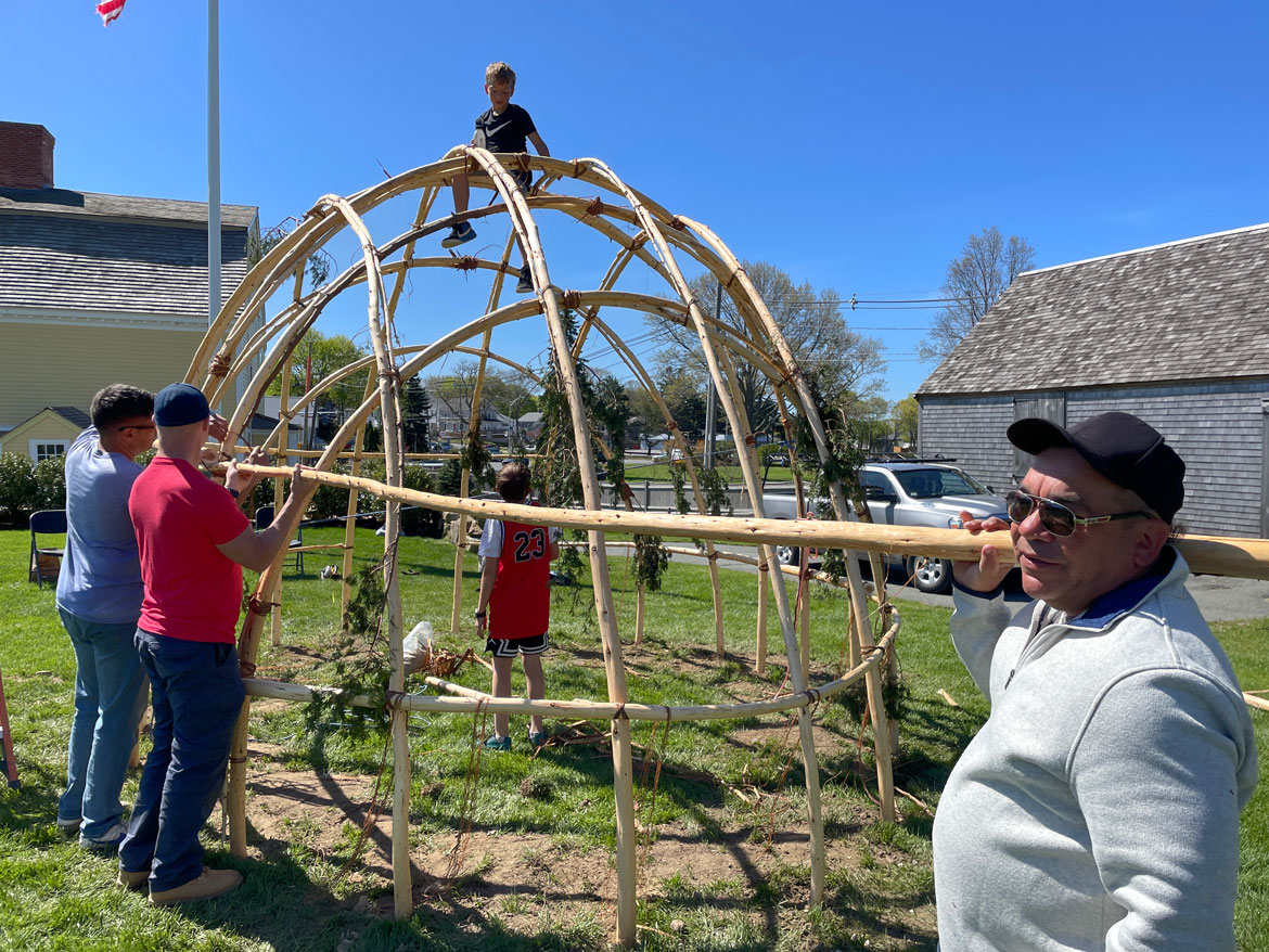 SmokeSygnals and partners contructing a wetu for "Native Waters; Native Lands" at the Cape Ann Museum Green, Gloucester, on May 5 and 7, 2023. (Courtesy Cape Ann Museum)