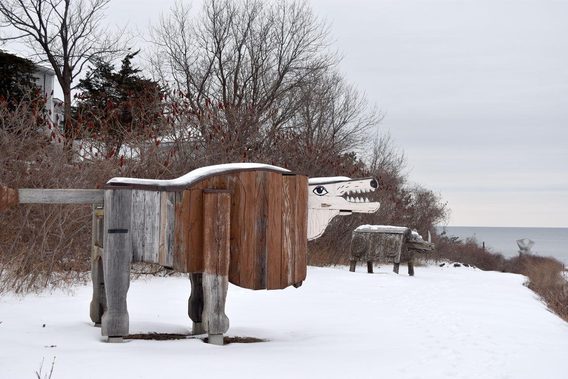 Bernard Langlais sculptures outside Ogunquit Museum of Art, Maine, Feb. 3, 2019. (Greg Cook photo)
