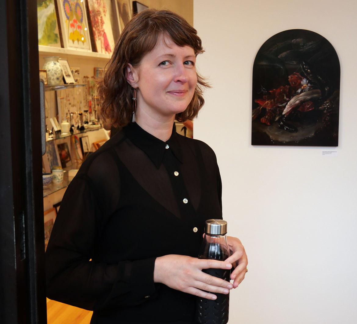 Nicole Duennebier at her exhibition "Tender Burden" at 13Forest Gallery, Arlington, May 20, 2023. (©Greg Cook photo)