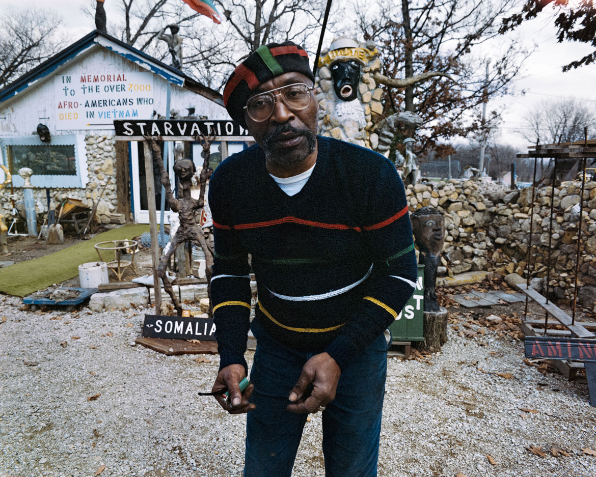 Ted Degener (American, b. 1948). Dr. Charles Smith stands outside of The African-American Heritage Museum and Black Veterans Archive in Aurora, Illinois, 1996. Archival pigment print. Photo courtesy Ted Degener