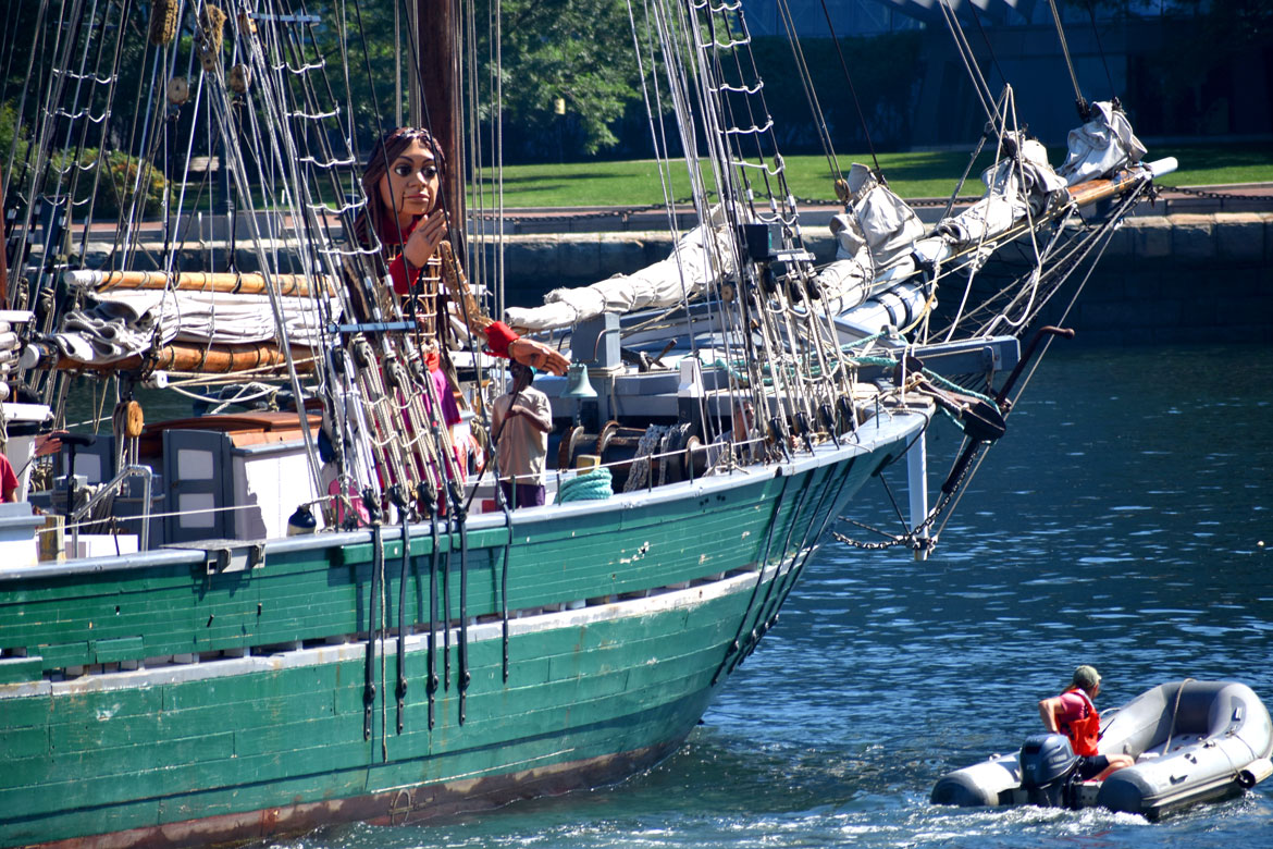 Little Amal heading by schooner toward Rowes Wharf, Boston, Sept. 7, 2023. (©Greg Cook photo)