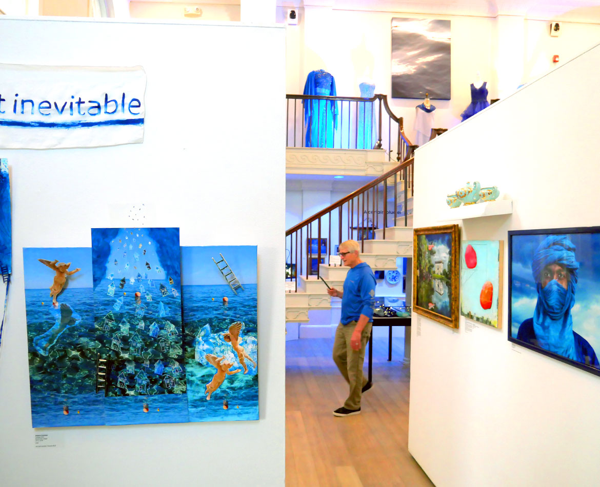 "Blue" at the Somerville Museum, with (at left) Johanna Schulman, "Perhaps," 2023, multimedia collage. (©Greg Cook photo)