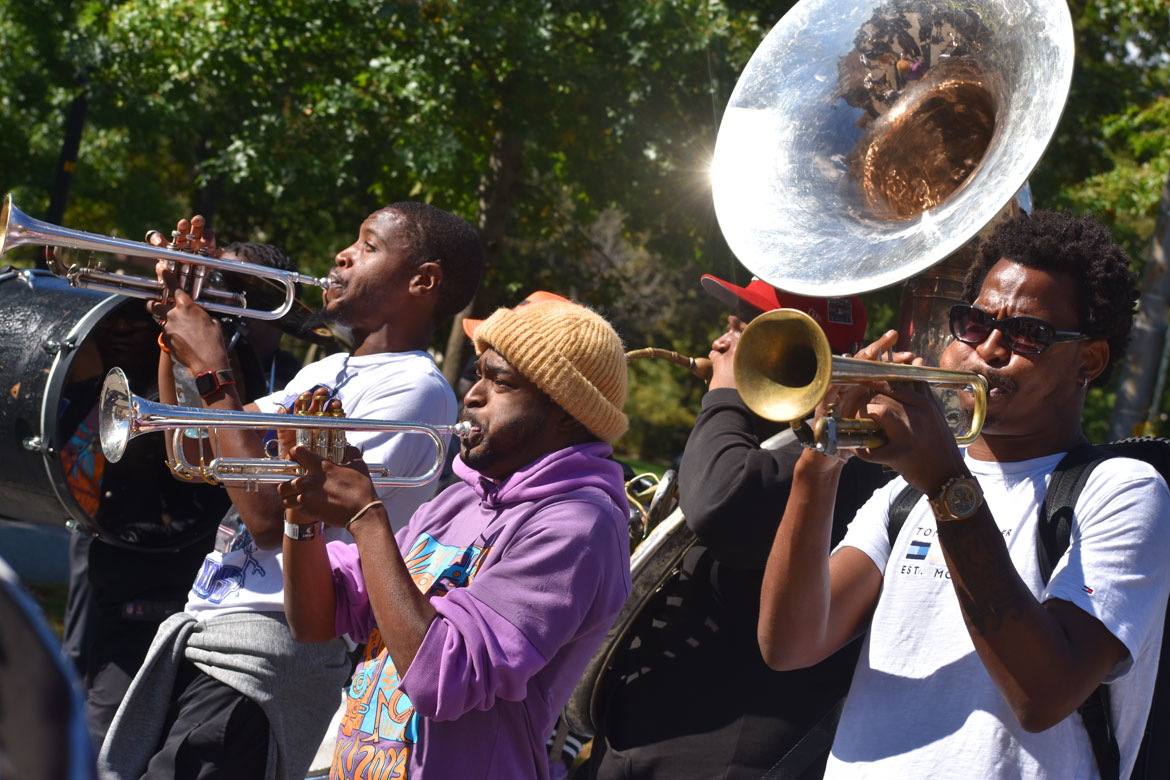 Young Fellaz Brass Band from New Orleans performs in the Honk Parade, Oct. 8, 2023. (©Greg Cook photo)