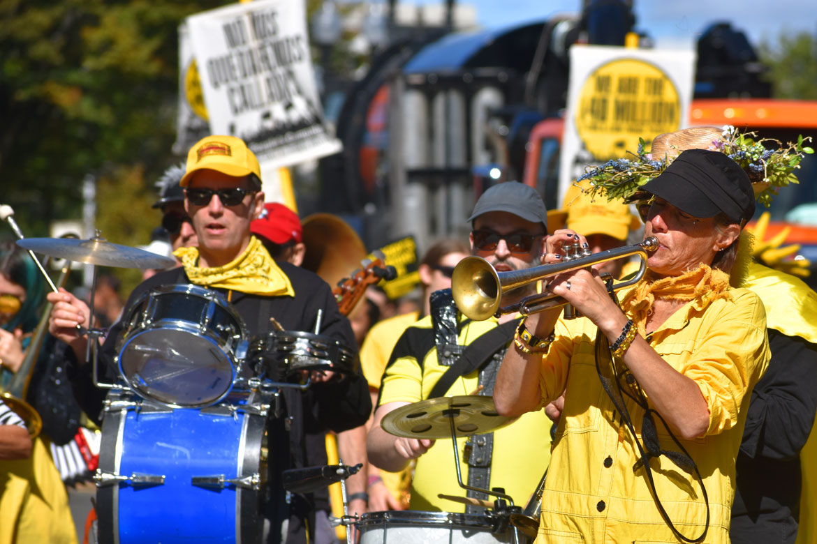 Expandable Brass Band from Northampton performs in the Honk Parade, Oct. 8, 2023. (©Greg Cook photo)