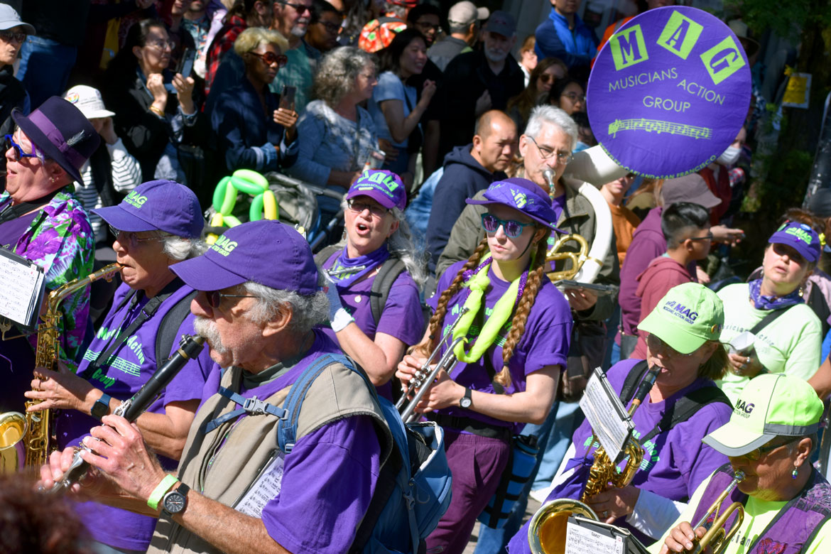Musicians Action Group from theSan Francisco Bay area performs in the Honk Parade, Oct. 8, 2023. (©Greg Cook photo)