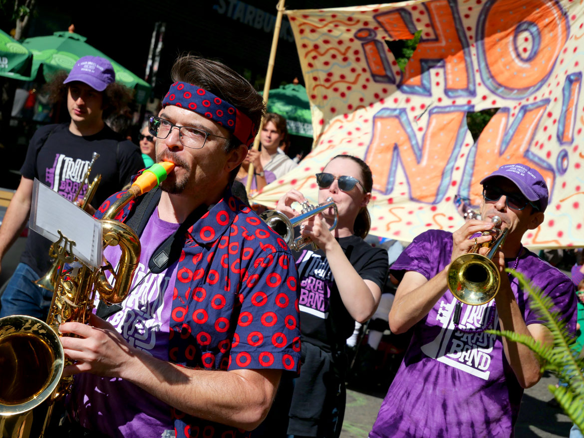 L Train Brass Band from Brooklyn performs in the Honk Parade, Oct. 8, 2023. (©Greg Cook photo)
