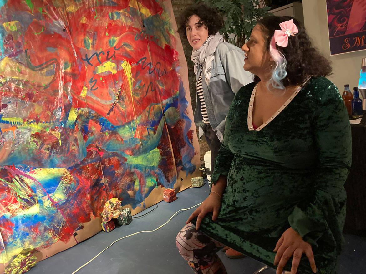 Dolly Letters (left) and gallery owner Parama Chattopadhyay at "Neurogenerative Room” at Out of the Blue Gallery, Somerville, Jan. 31, 2024. (©Greg Cook photo)