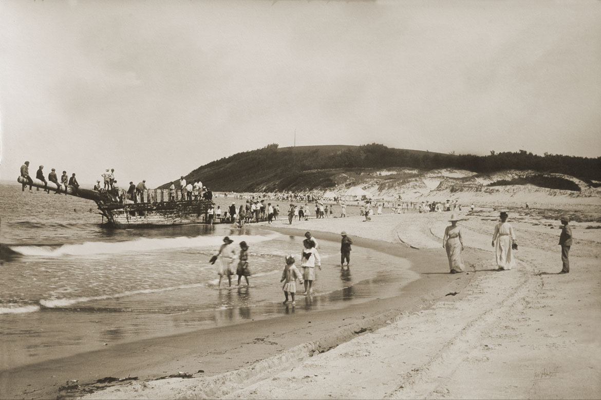 The wreck of the Ada K. Damon during a public Crane Beach picnic in 1911. (Courtesy Trustees Archives)