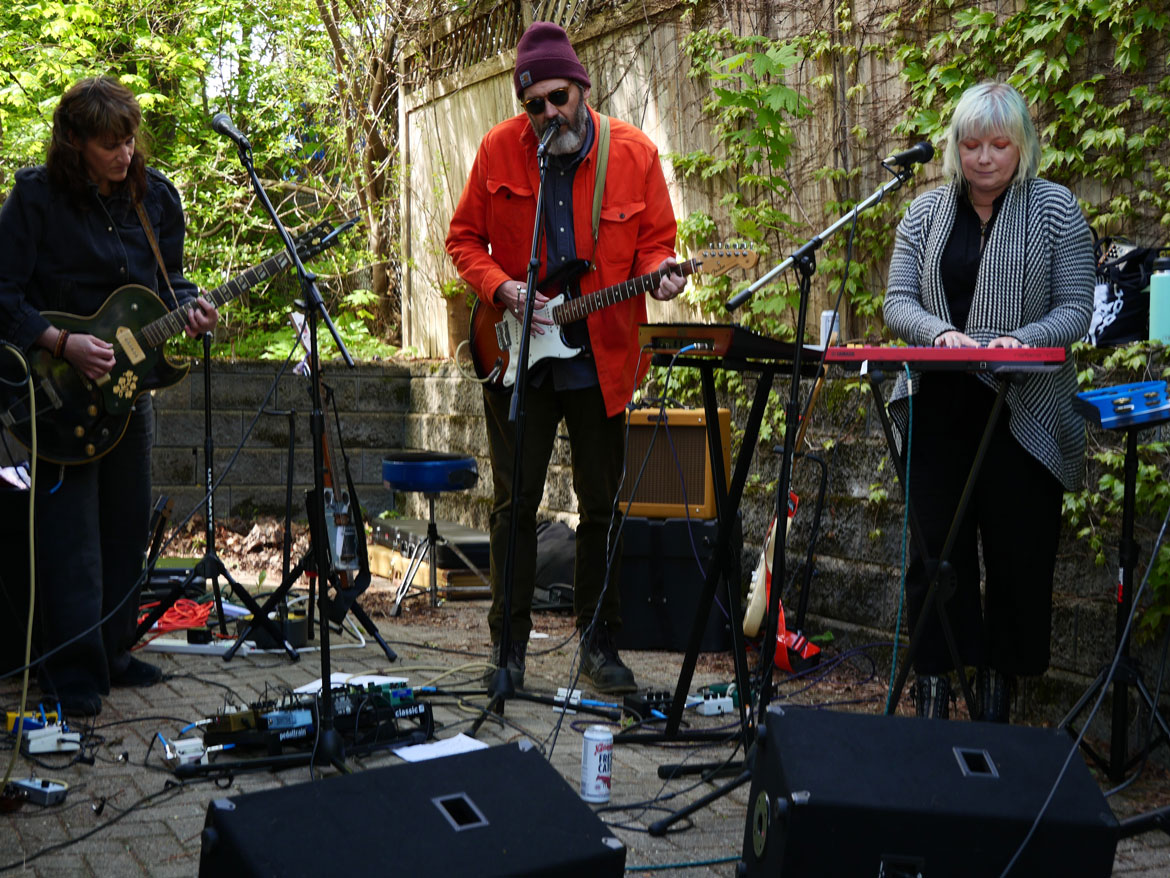 Daughter of the Vine performed on Summer Street during the 2024 Somerville Porchfest, May 11, 2024. (©Greg Cook photo)