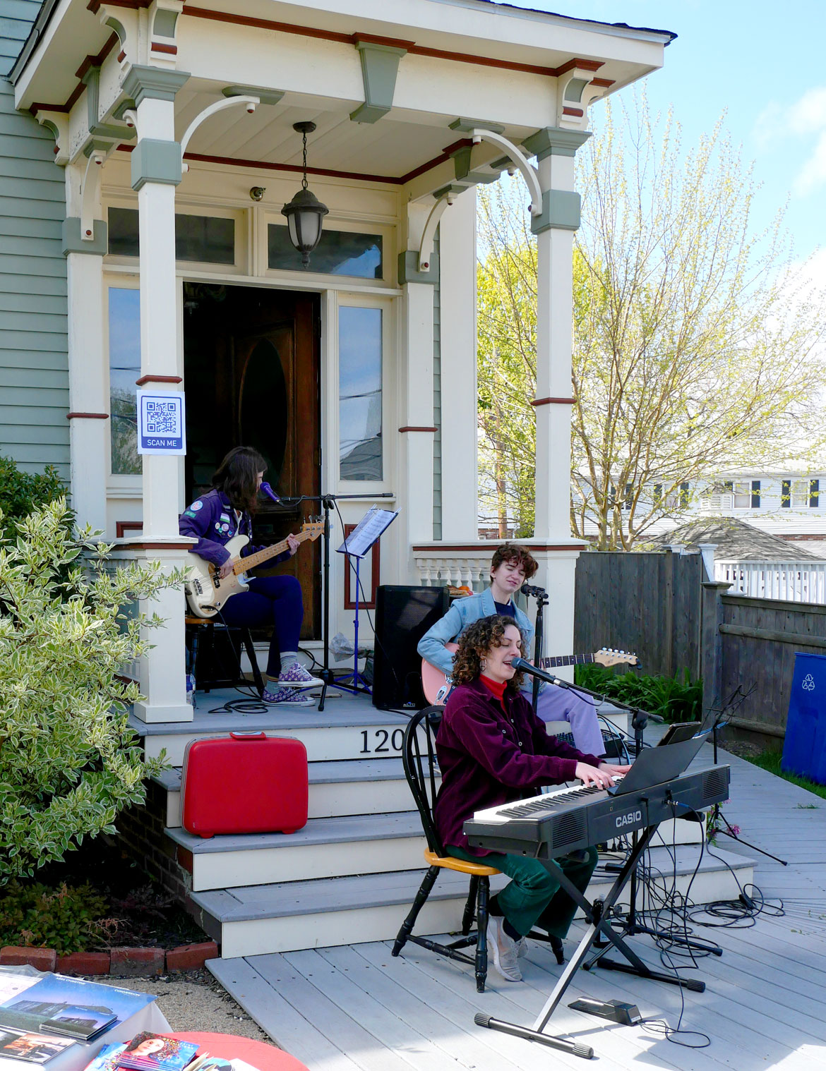 Eva Gertz, Talia Rose and Miss Christine performed on Central Street during the 2024 Somerville Porchfest, May 11, 2024. (©Greg Cook photo)