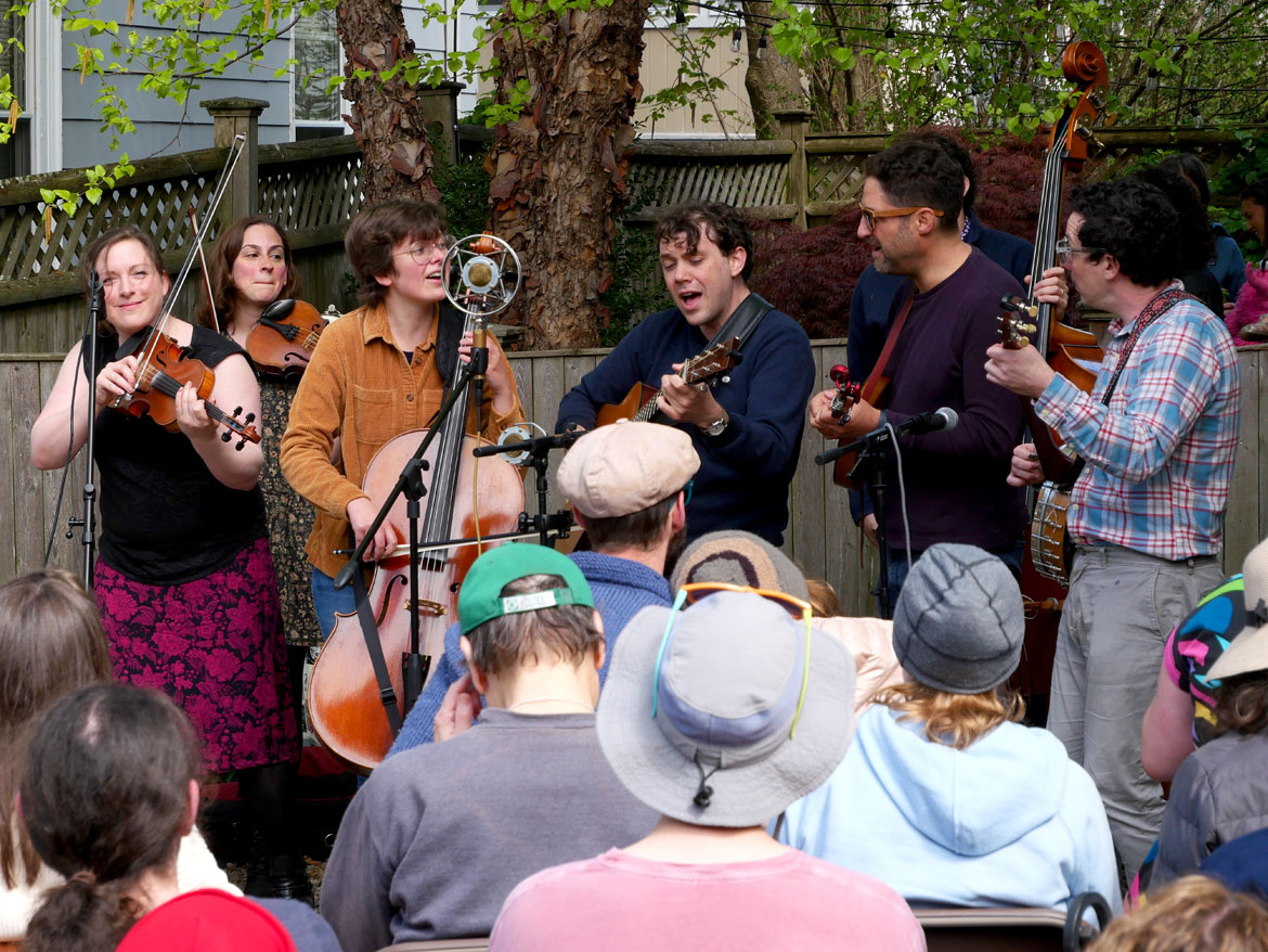 The New Grown-Ups performed on Lowell Street during the 2024 Somerville Porchfest, May 11, 2024. (©Greg Cook photo)