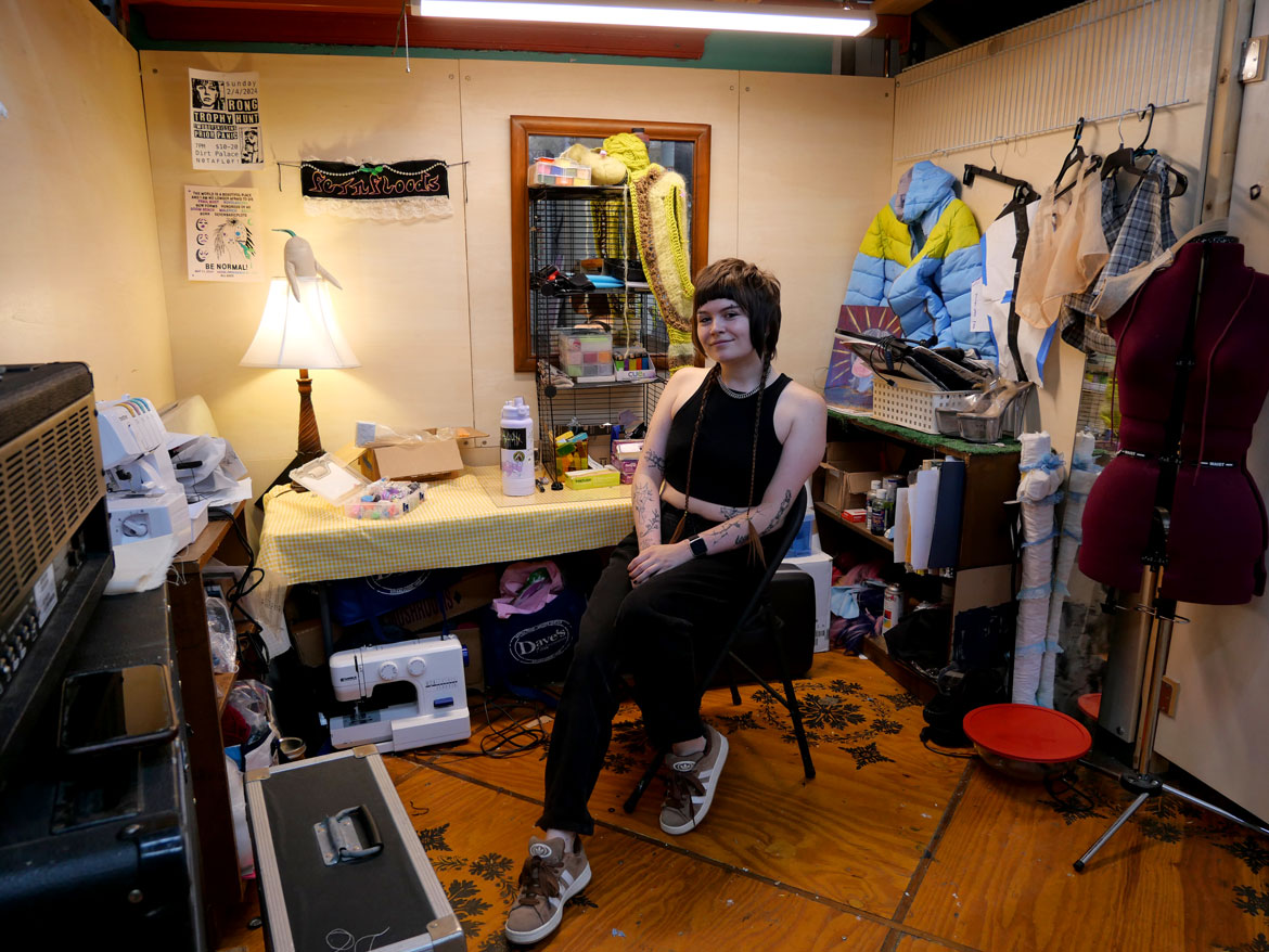 Ses Houghton in their studio at the Dirt Palace, Providence, August 2025. (©Greg Cook photo)
