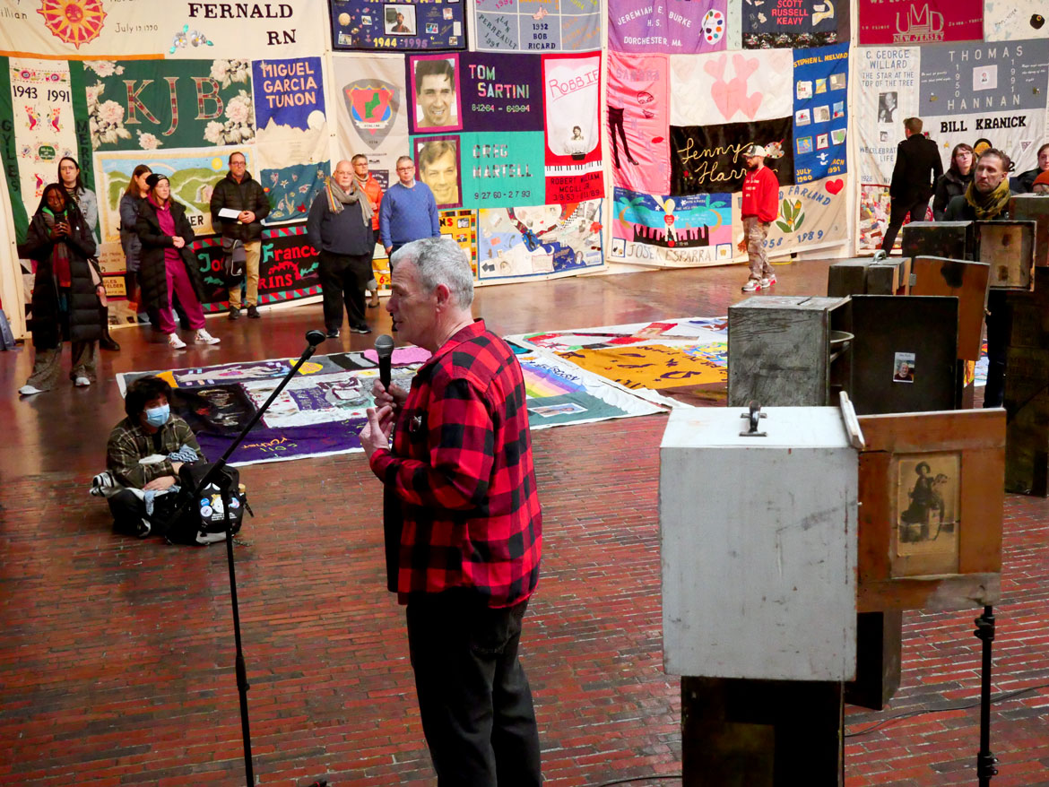Michael Dowling, Spoke founder and artistic director, speaks at 34th Annual World AIDS Day Vigil at the Boston Center for the Arts, Nov. 30, 2025. (©Greg Cook photo)