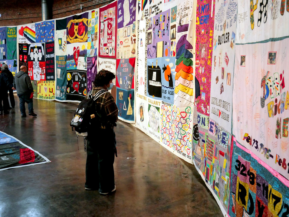 Names AIDS Memorial Quilt at the 34th Annual World AIDS Day Vigil at the Boston Center for the Arts, Nov. 30, 2025. (©Greg Cook photo)