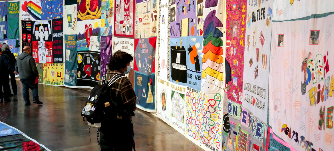 Names AIDS Memorial Quilt at the 34th Annual World AIDS Day Vigil at the Boston Center for the Arts, Nov. 30, 2025. (©Greg Cook photo)