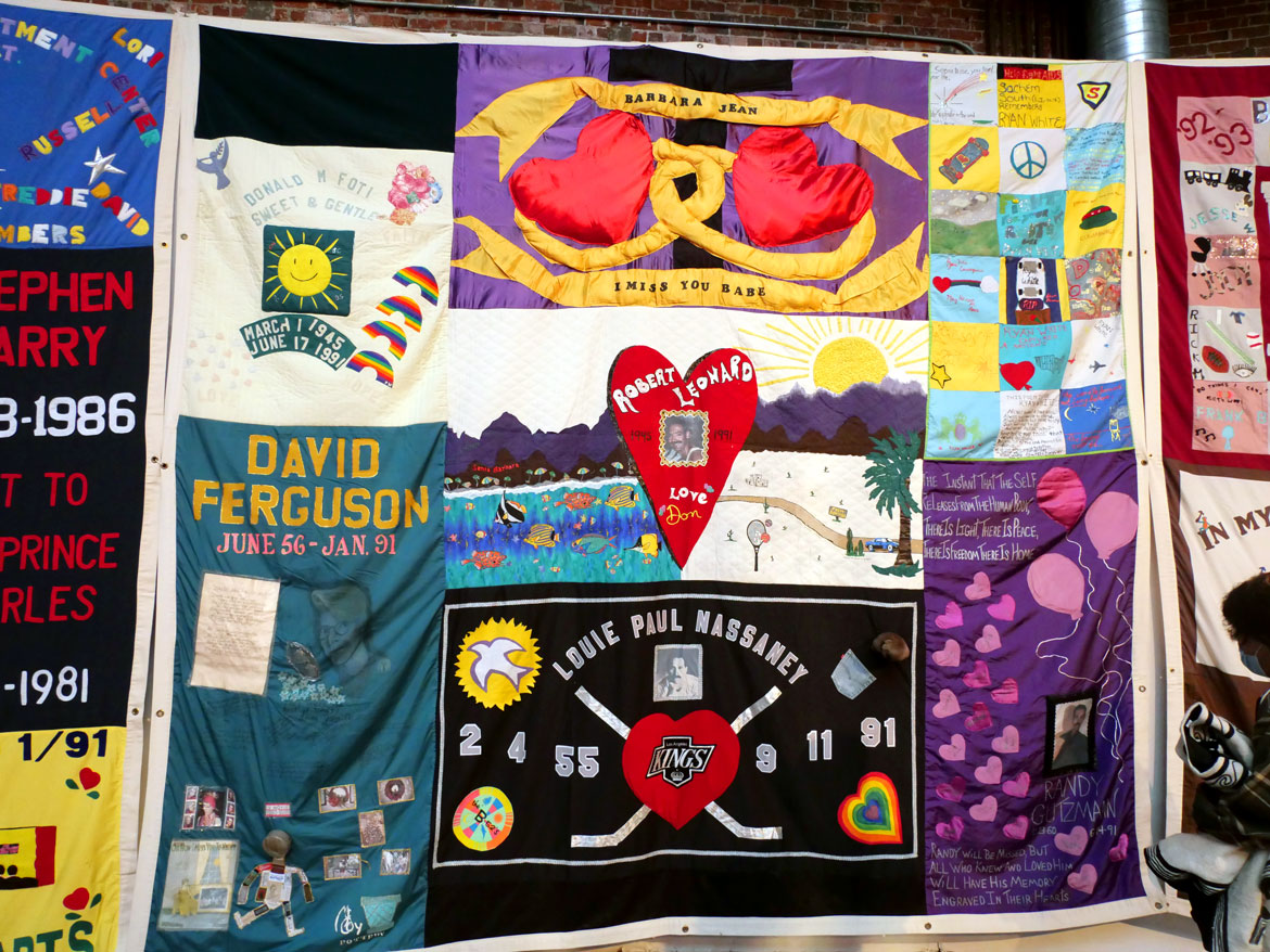 Names AIDS Memorial Quilt at the 34th Annual World AIDS Day Vigil at the Boston Center for the Arts, Nov. 30, 2025. (©Greg Cook photo)