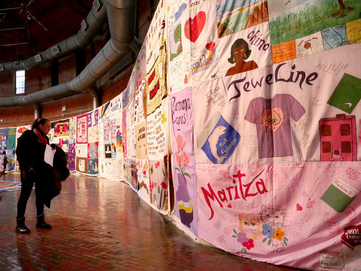 Names AIDS Memorial Quilt at the 34th Annual World AIDS Day Vigil at the Boston Center for the Arts, Nov. 30, 2025. (©Greg Cook photo)