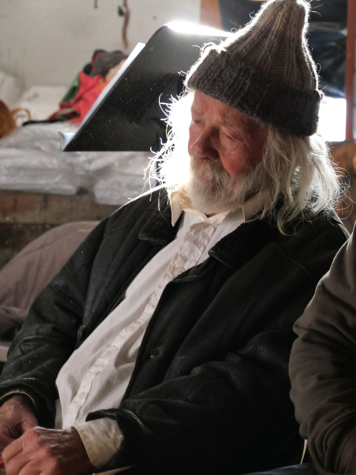 Peter Schumann watches Bread and Puppet Theater perform Bread and Puppet Theater “Life and Death Precision Dances” in the Ballroom at the Glover, Vermont, farm, Feb. 8, 2026. (©Greg Cook photo)