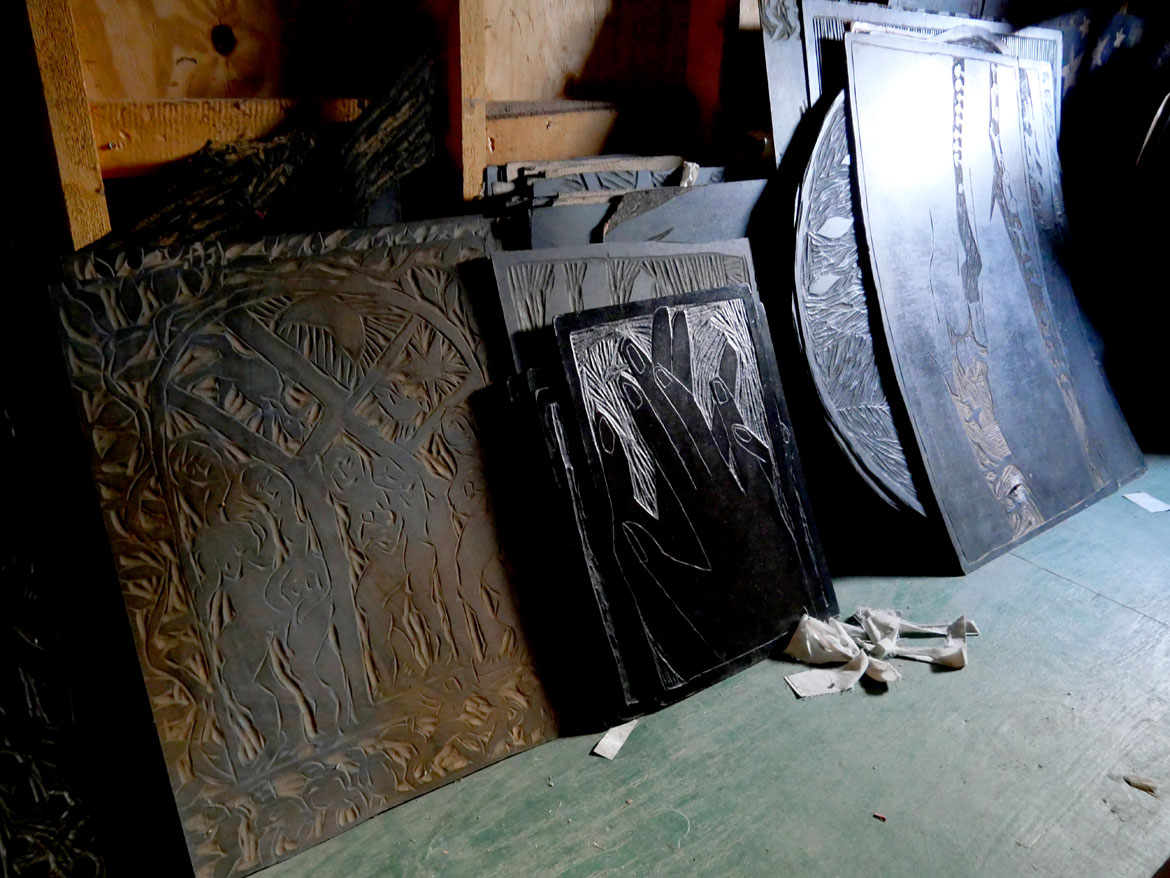 Masonite woodcut panels carved by Peter Schumann in Printshop at Bread and Puppet Theater, Glover, Vermont, Feb. 9, 2026. (©Greg Cook photo)