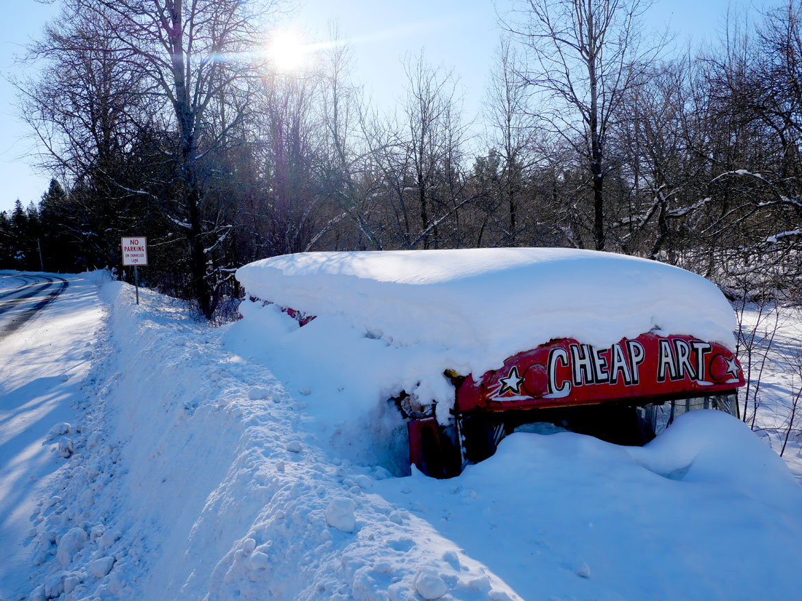 Cheap Art Bus snowed in at Bread and Puppet Theater, Glover, Vermont, Feb. 9, 2026. (©Greg Cook photo)