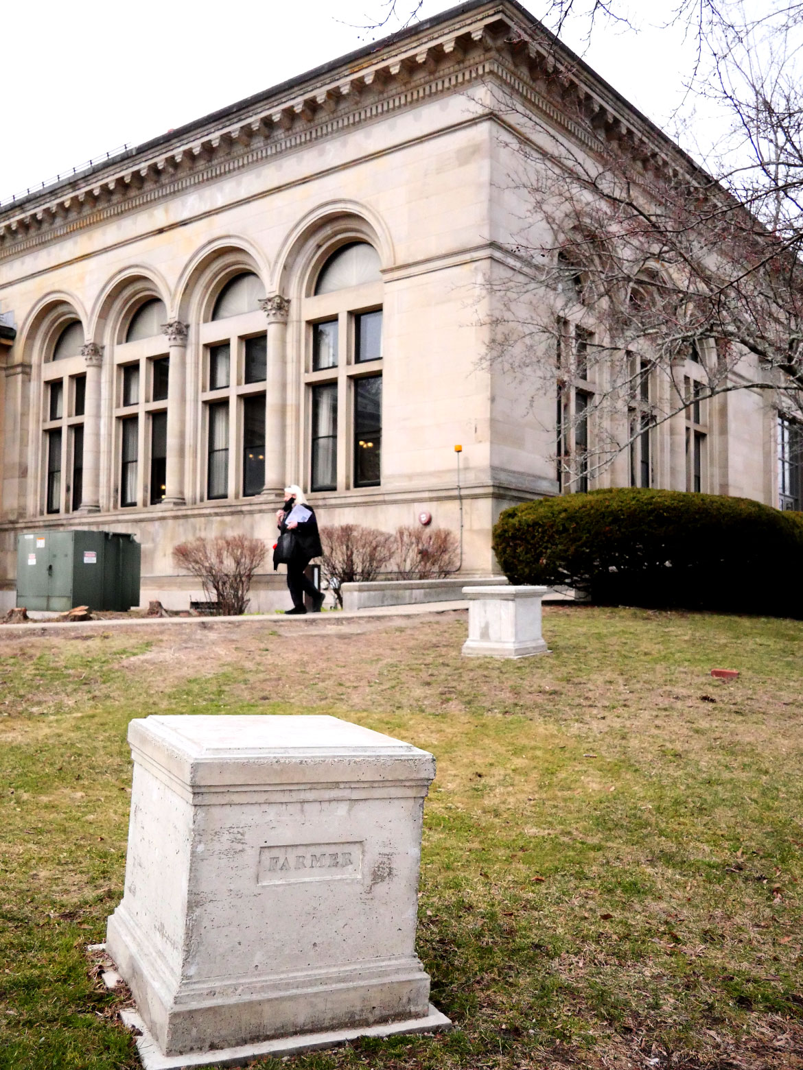 Christopher Frost, "A Remembrance of Menotomy's Everyday Defenders, 1775," 2025, cast concrete pedestals outside Arlington's Robbins Memorial Library. (©Greg Cook photo)