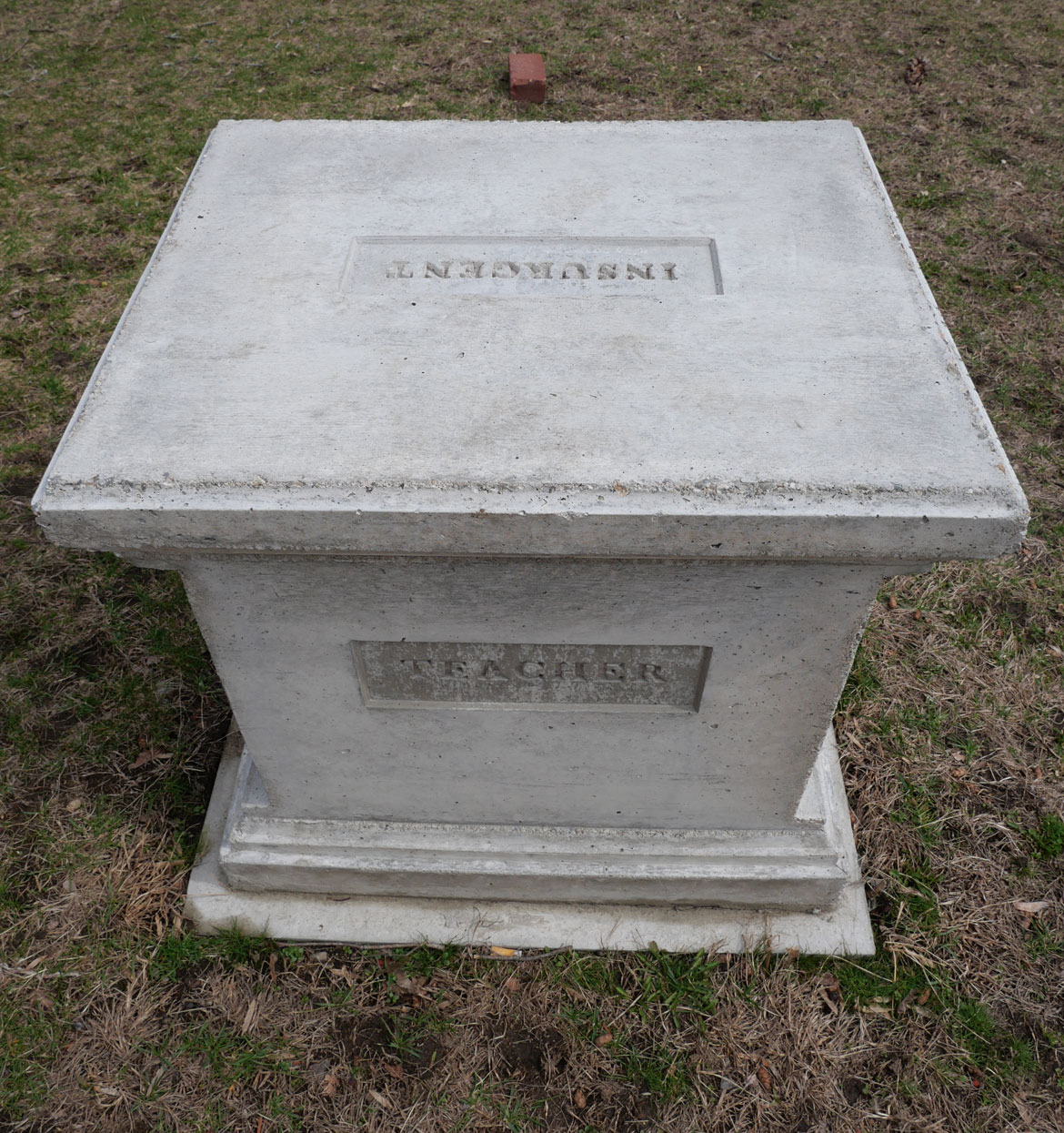 Christopher Frost, "A Remembrance of Menotomy's Everyday Defenders, 1775," 2025, cast concrete pedestals outside Arlington's Robbins Memorial Library. (©Greg Cook photo)