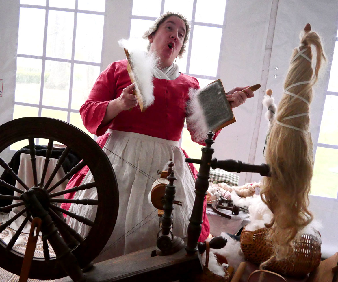 Carding wool at Gore Place Sheepshearing Festival, Waltham, April 25, 2026. (©Greg Cook photo)