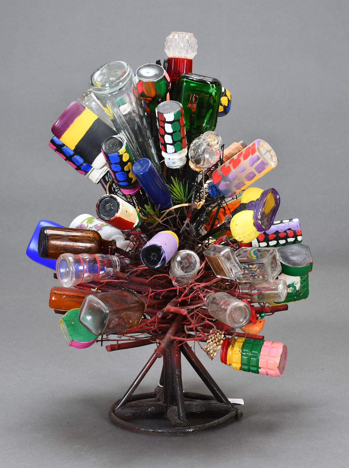 L.V. Hull, Untitled, n.d. Acrylic paint, plastic and glass bottles, tabletop Christmas tree, 19x12x14. Courtesy of the Estate of L.V. Hull, Arts Foundation of Kosciusko. Gift of Kohler Foundation, Inc.
