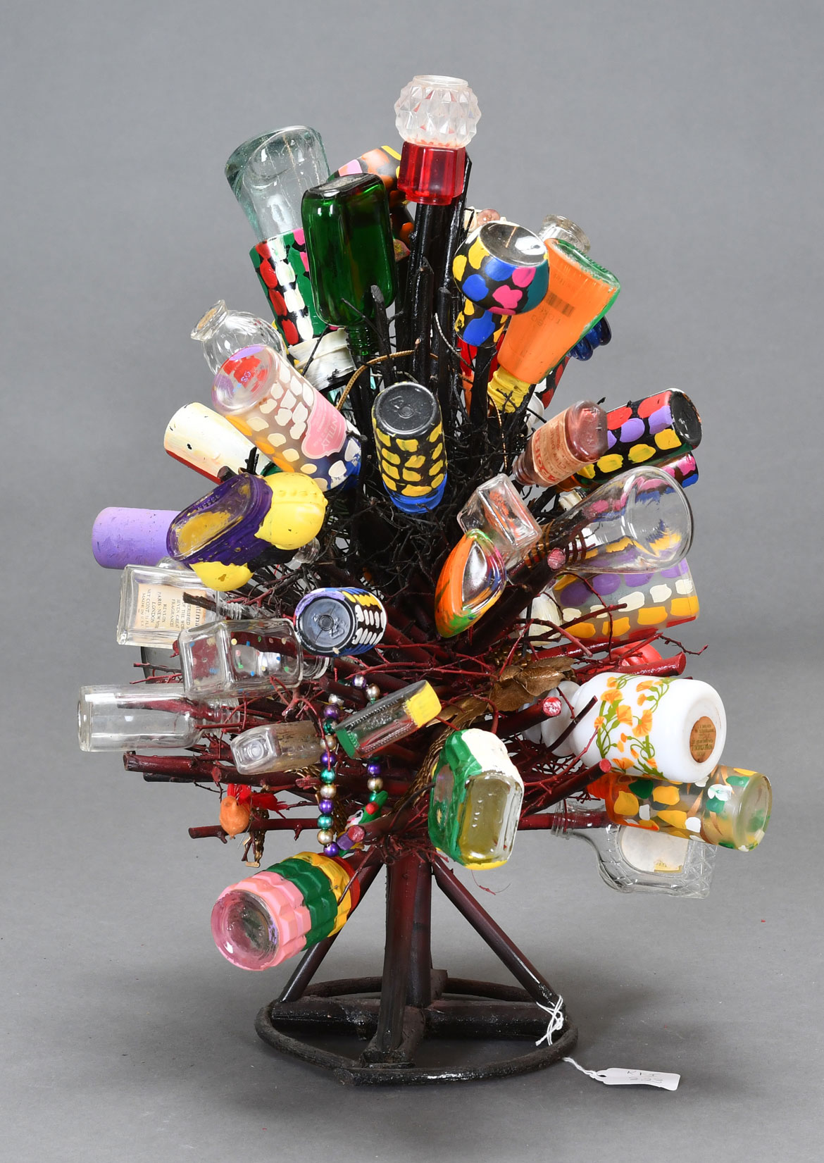 L.V. Hull, Untitled, n.d. Acrylic paint, plastic and glass bottles, tabletop Christmas tree, 19x12x14. Courtesy of the Estate of L.V. Hull, Arts Foundation of Kosciusko. Gift of Kohler Foundation, Inc.