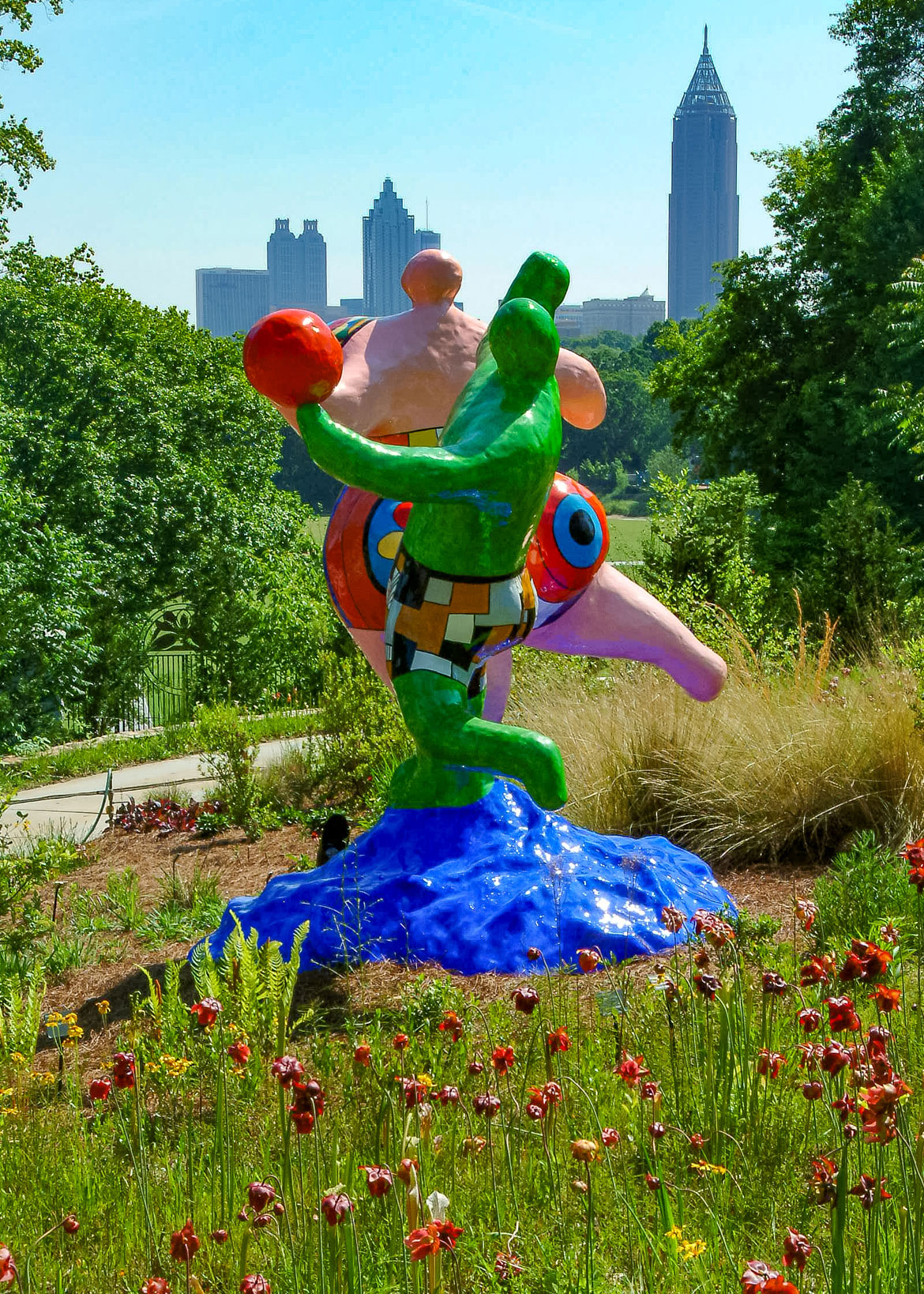 Niki de Saint Phalle. "Les Baigneurs," 1983. Installed at the Atlanta Botanical Garden, 2006 © 2026 Niki Charitable Art Foundation, All rights reserved. (Photo: Kristen Alexander )