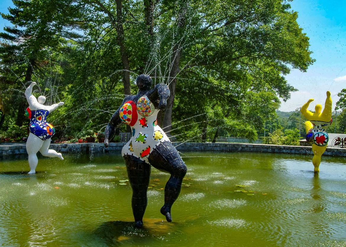 Niki de Saint Phalle. "Les Trois Grâces Fontaine," 1999. Installed at the Atlanta Botanical Garden, 2006 © 2026 Niki Charitable Art Foundation, All rights reserved. (Photo: Kristen Alexander)