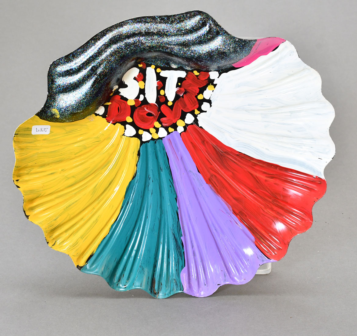 L.V. Hull, Untitled, 2004. Acrylic paint on plastic, 12.5 x 13.5 x 1.5 inches. Courtesy of the Estate of L.V. Hull, Arts Foundation of Kosciusko. Gift of Kohler Foundation, Inc.