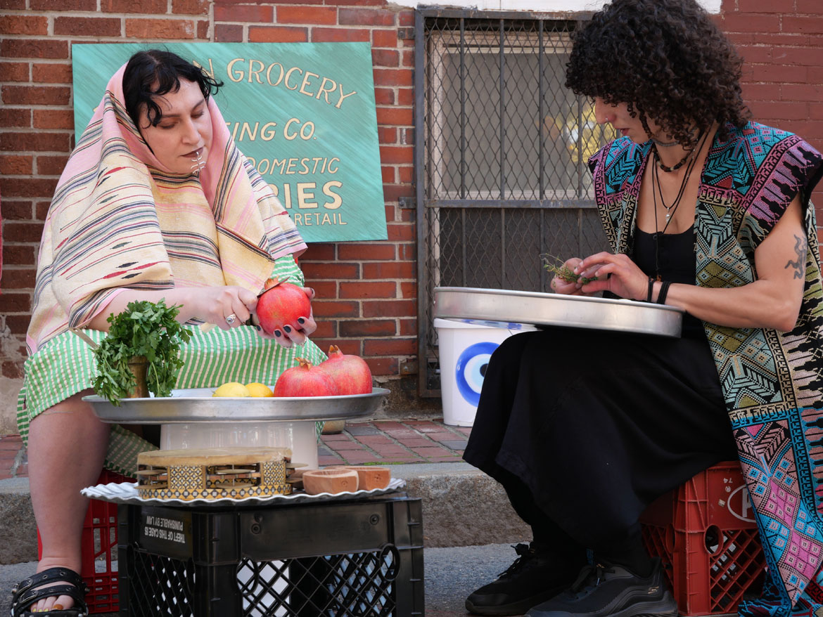 Feda Eid and Jassi Murad perform "Plantcestors, Awakening the Sacred" at Johnny Court, Chinatown, Boston, May 16, 2026. (©Greg Cook photo)