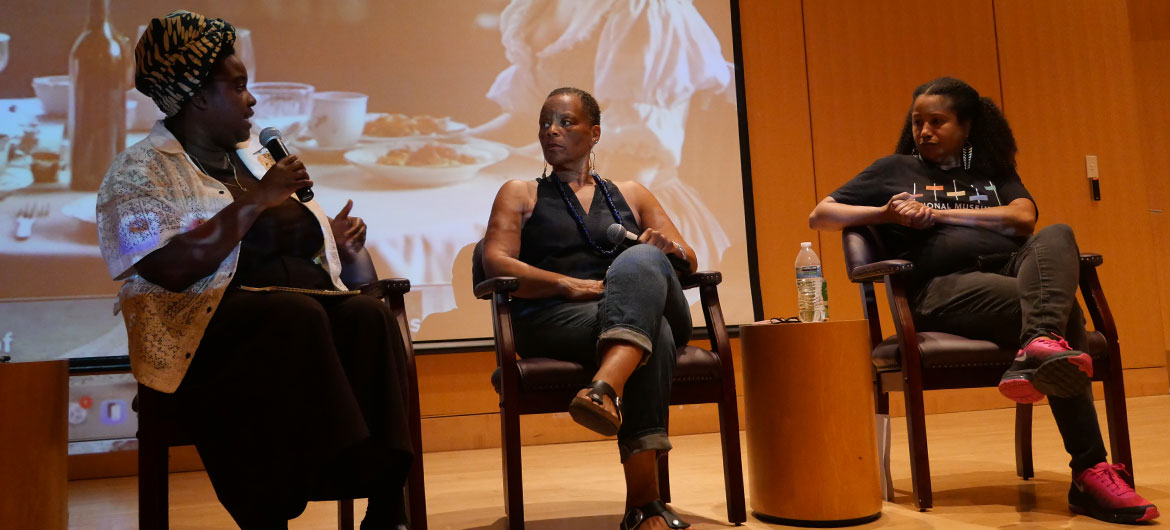 Royall House and Slave Quarters Executive Director Kyera Singleton (from left) and artists Ife Franklin and Dell Marie Hamilton speak at “Land/Mark: Enslavement, Resistance and Revolution" at the Cambridge Public Library, June 13, 2026. (©Greg Cook photo)