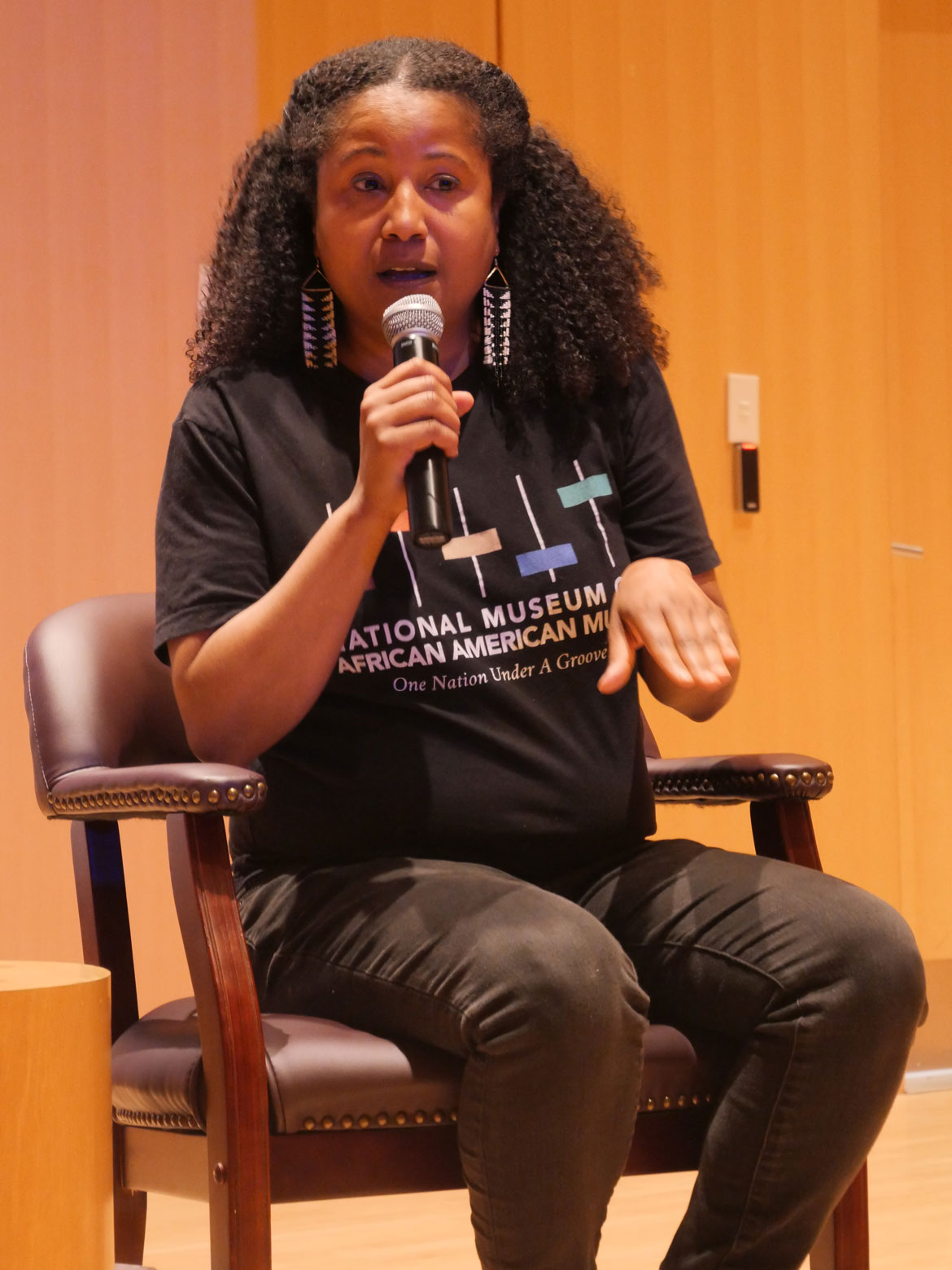Dell Marie Hamilton speaks at “Land/Mark: Enslavement, Resistance and Revolution" at the Cambridge Public Library, June 13, 2026. (©Greg Cook photo)