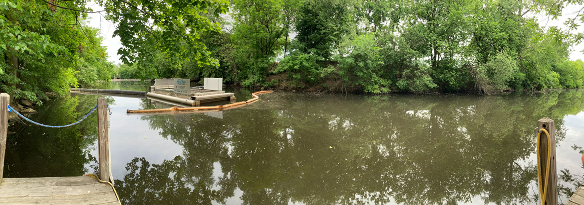 Trash Trap on Malden River, June 26, 2026. (©Greg Cook photo)