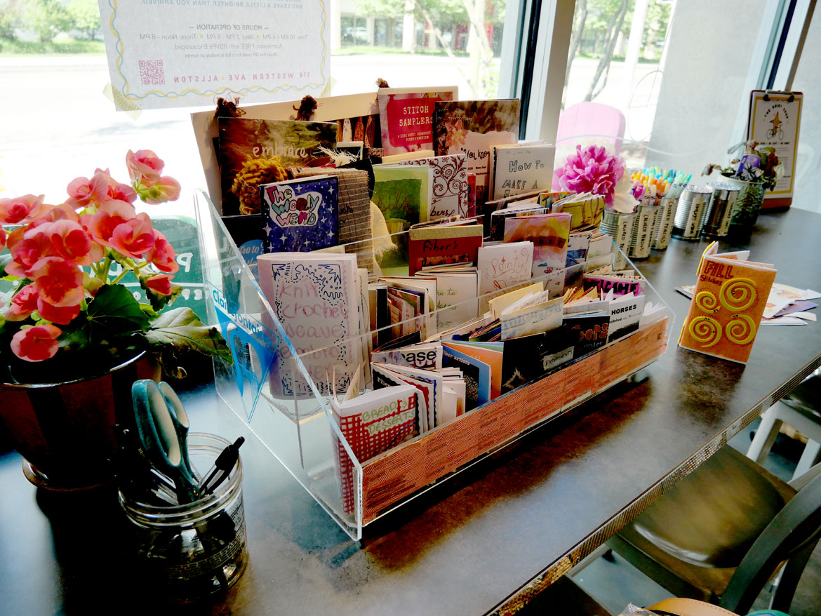 Zine library at The Shiny Shop, June 13, 2026. (©Greg Cook photo)
