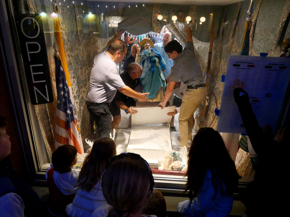 Returning the statue of St. Peter to the St. Peter's Club on the last night of the Novena that begins the annual St. Peter's Fiesta, Gloucester, June 23, 2026. (©Greg Cook photo)