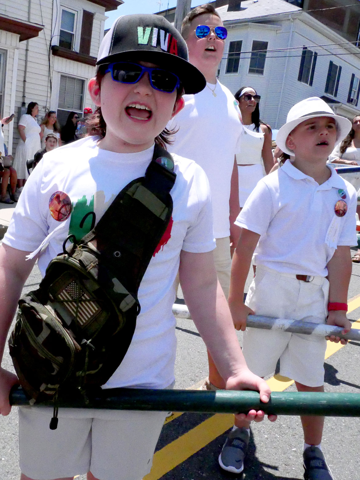 Shouting blessings during St. Peter’s Fiesta Sunday Procession, Gloucester, June 28, 2026. (©Greg Cook photo)